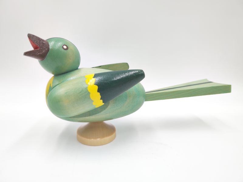 Vogel mit Sockel, Erlenzeisig